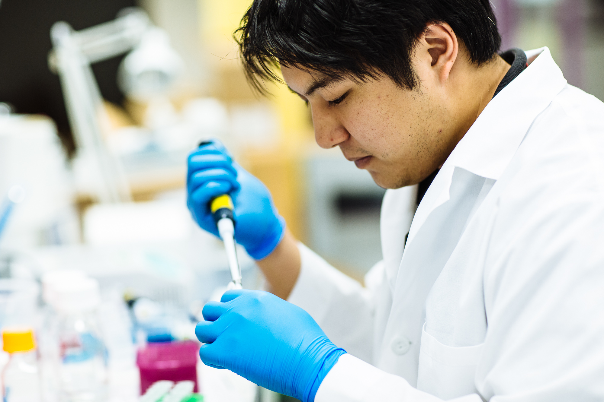 Lab technician working with a lab sample.